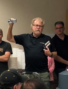 Fred Ode showing vintage Foundation Software diskettes